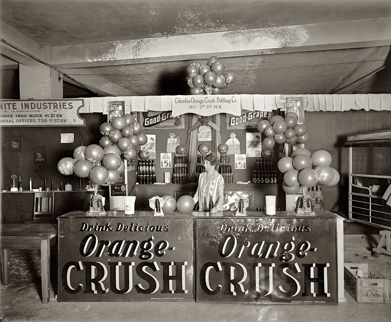 Orange Crush booth at a fair
