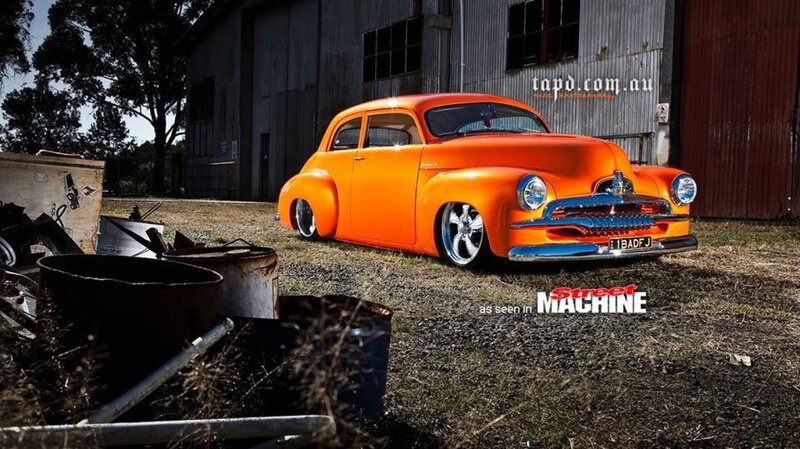 Orange Custom Car — Dramatic, Afternoon, Photograph, Building