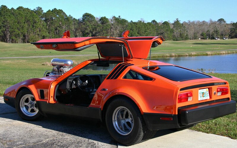 Orange Custom Car — Serene, Afternoon, Photograph, Golf Course