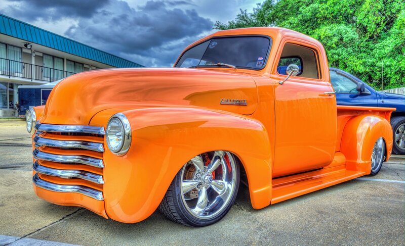 Orange Custom Pickup Truck — Dramatic, Afternoon, Photograph, Building