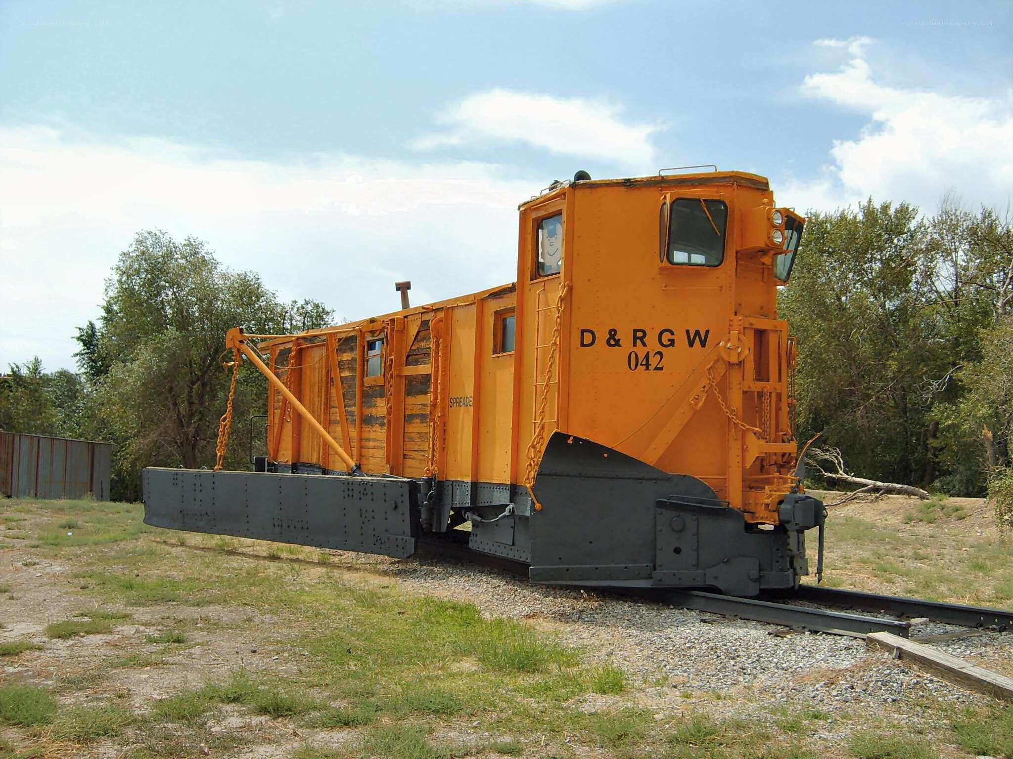 Orange D&RGW caboose on display