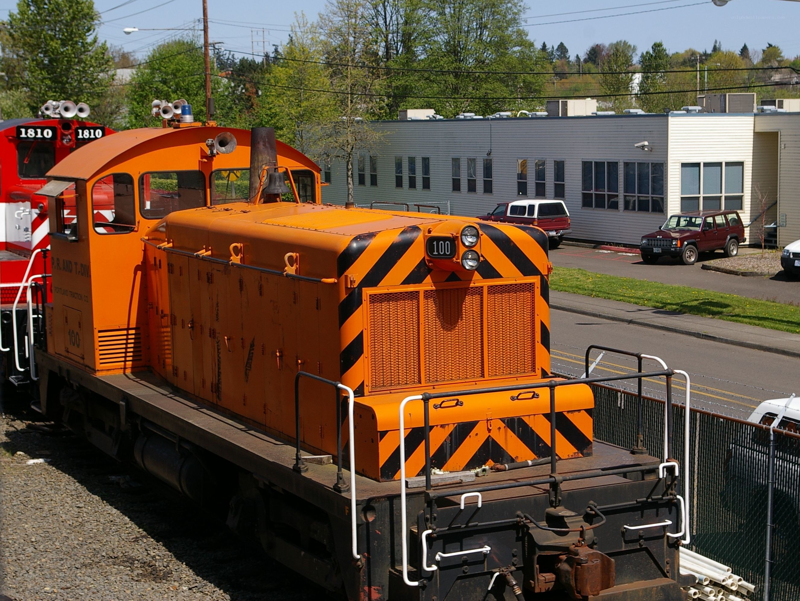 Orange diesel locomotives on display