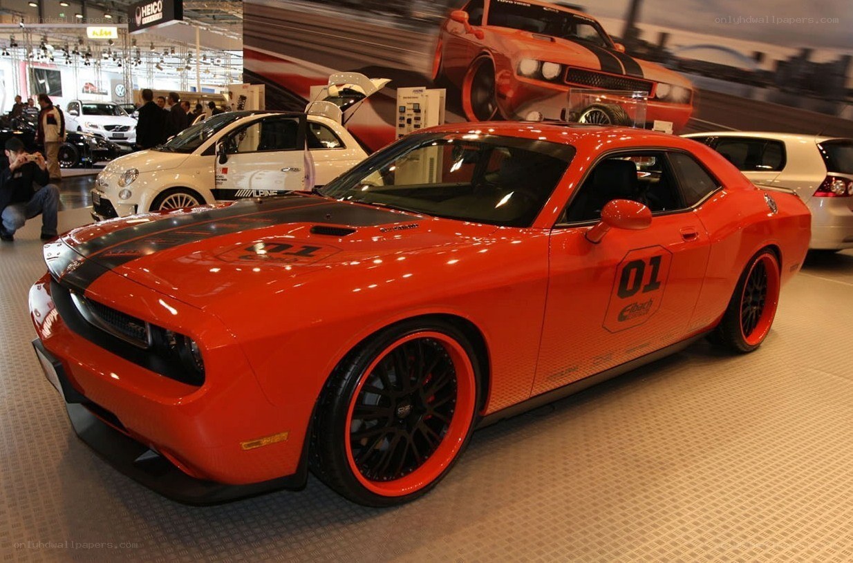 Orange Dodge Challenger at auto show