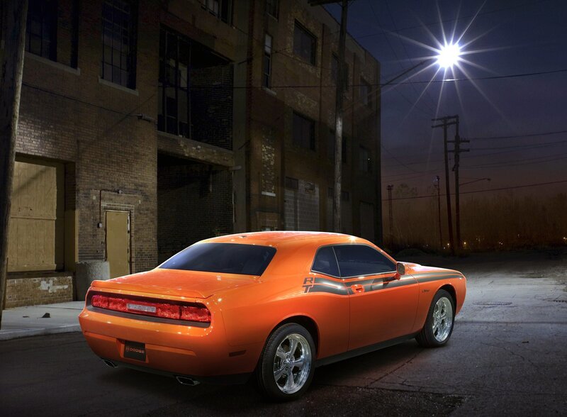 Orange Dodge Challenger at night