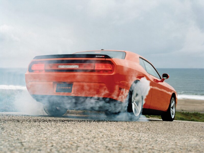 Orange Dodge Challenger burnout