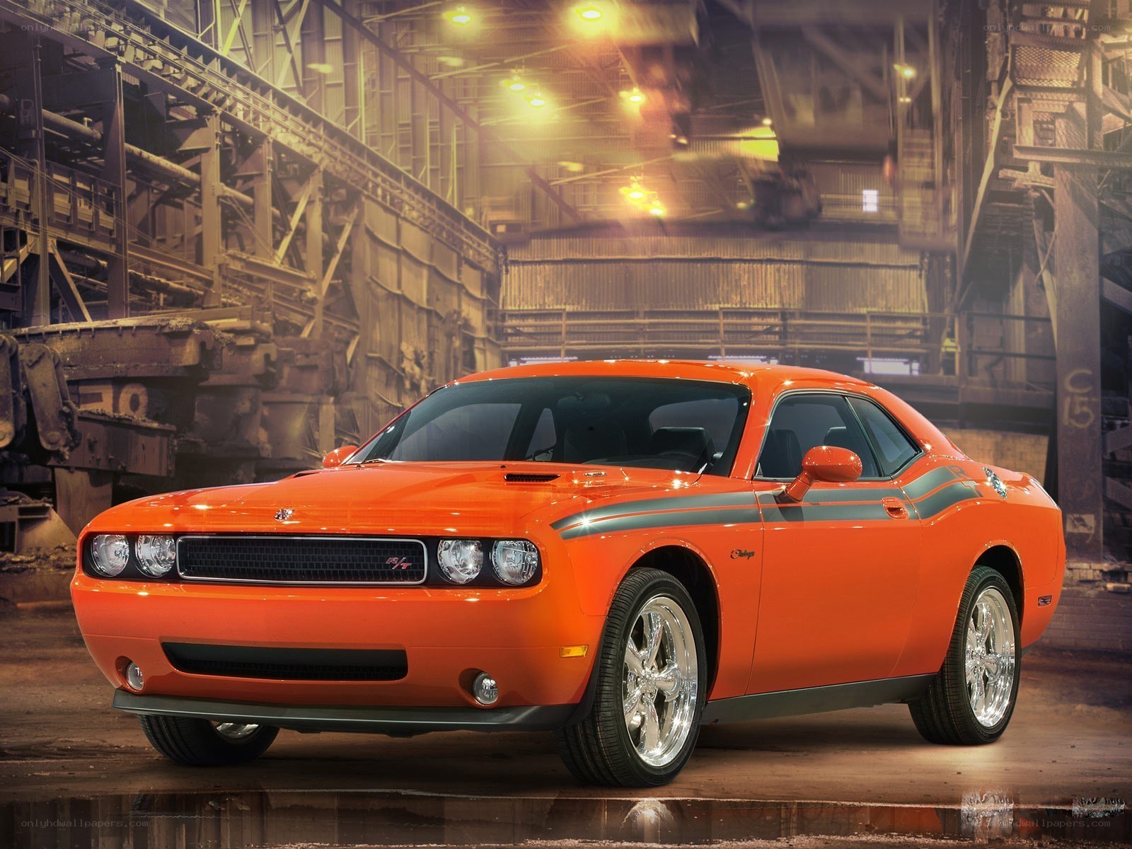 Orange Dodge Challenger in warehouse
