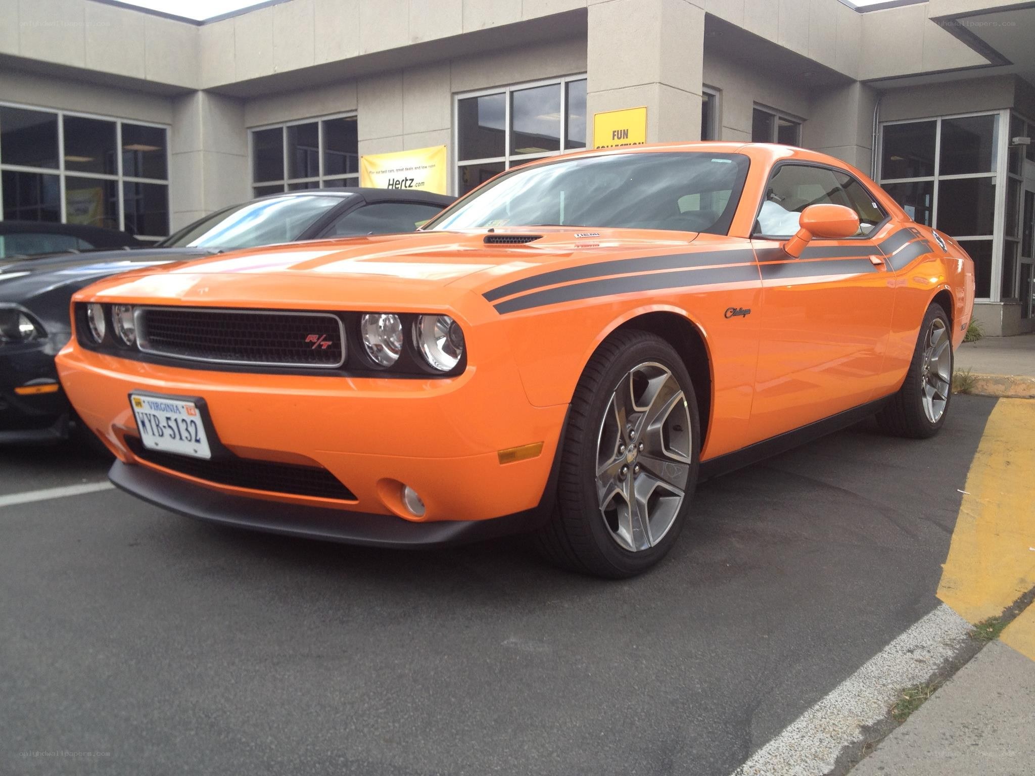 Orange Dodge Challenger parked
