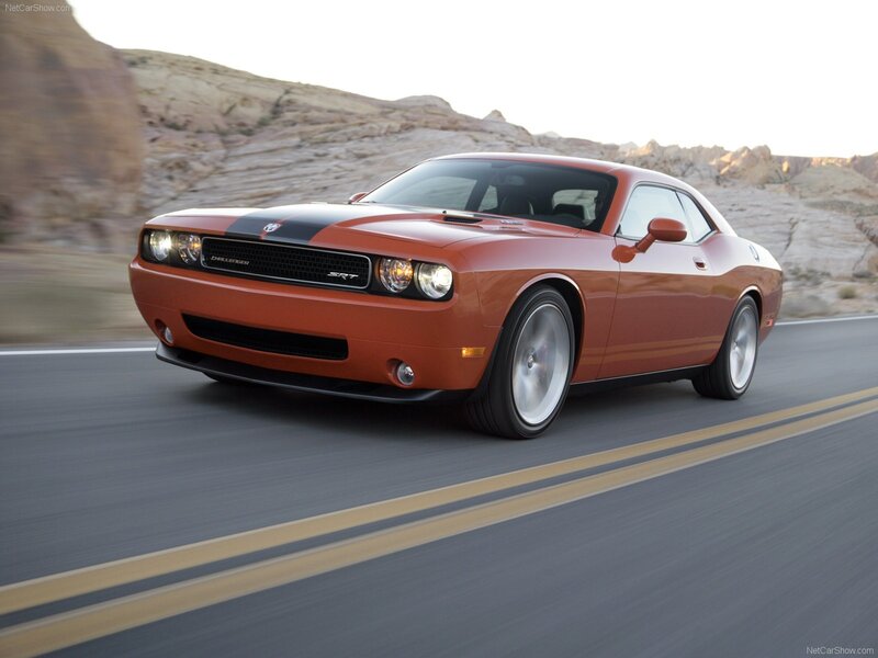 Orange Dodge Challenger SRT driving