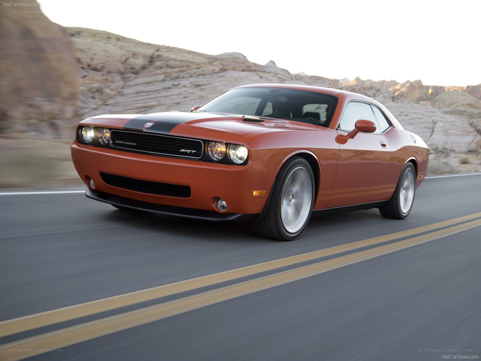 Orange Dodge Challenger SRT driving