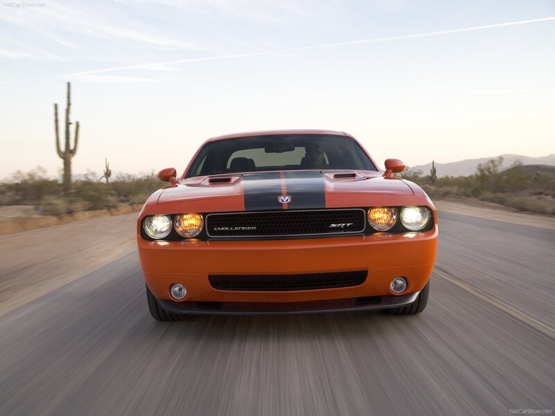 Orange Dodge Challenger SRT driving