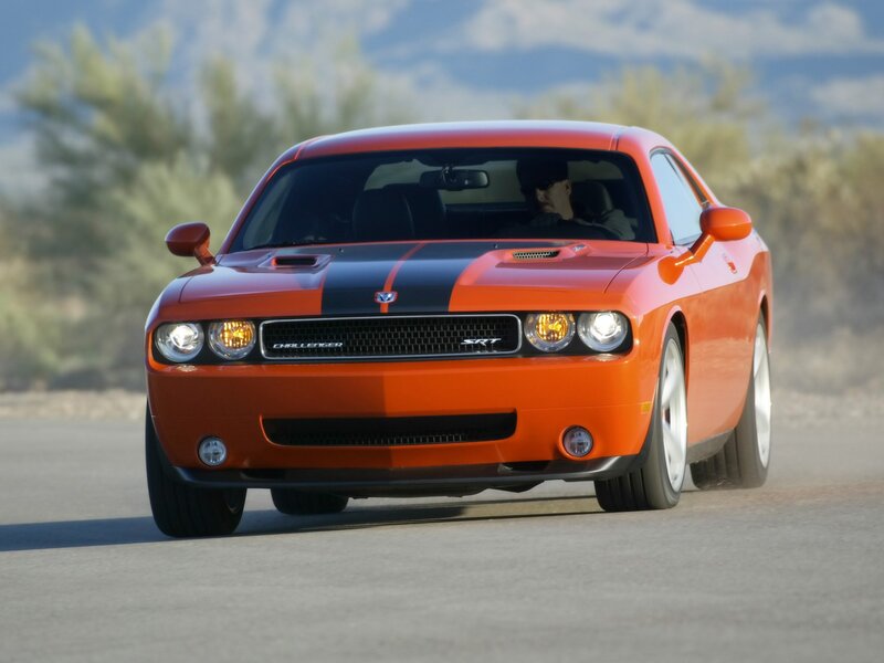 Orange Dodge Challenger SRT driving