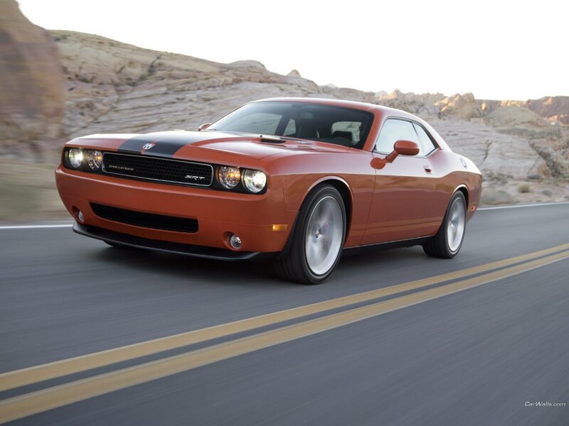 Orange Dodge Challenger SRT on desert road