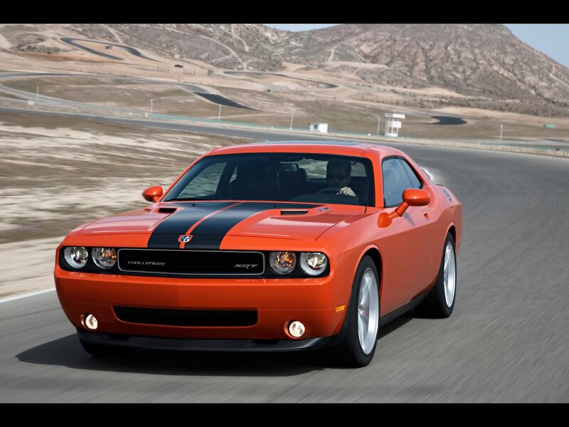 Orange Dodge Challenger SRT on track