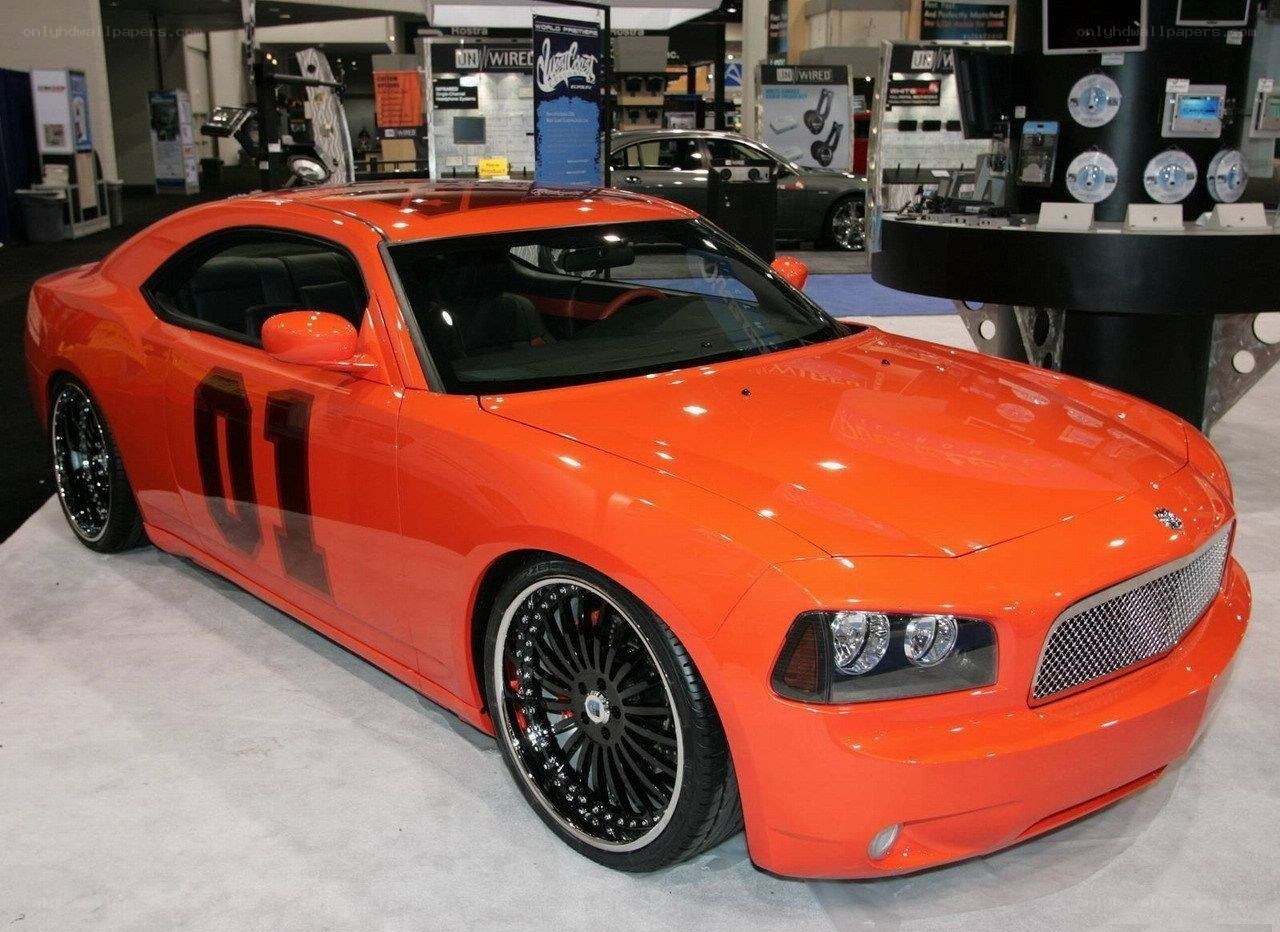 Orange Dodge Charger at auto show