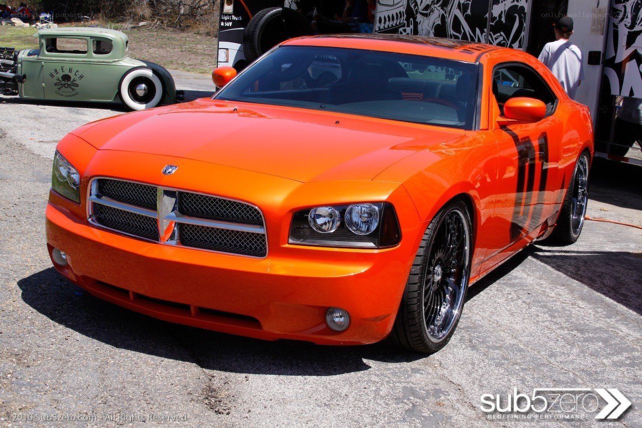 Orange Dodge Charger at car show