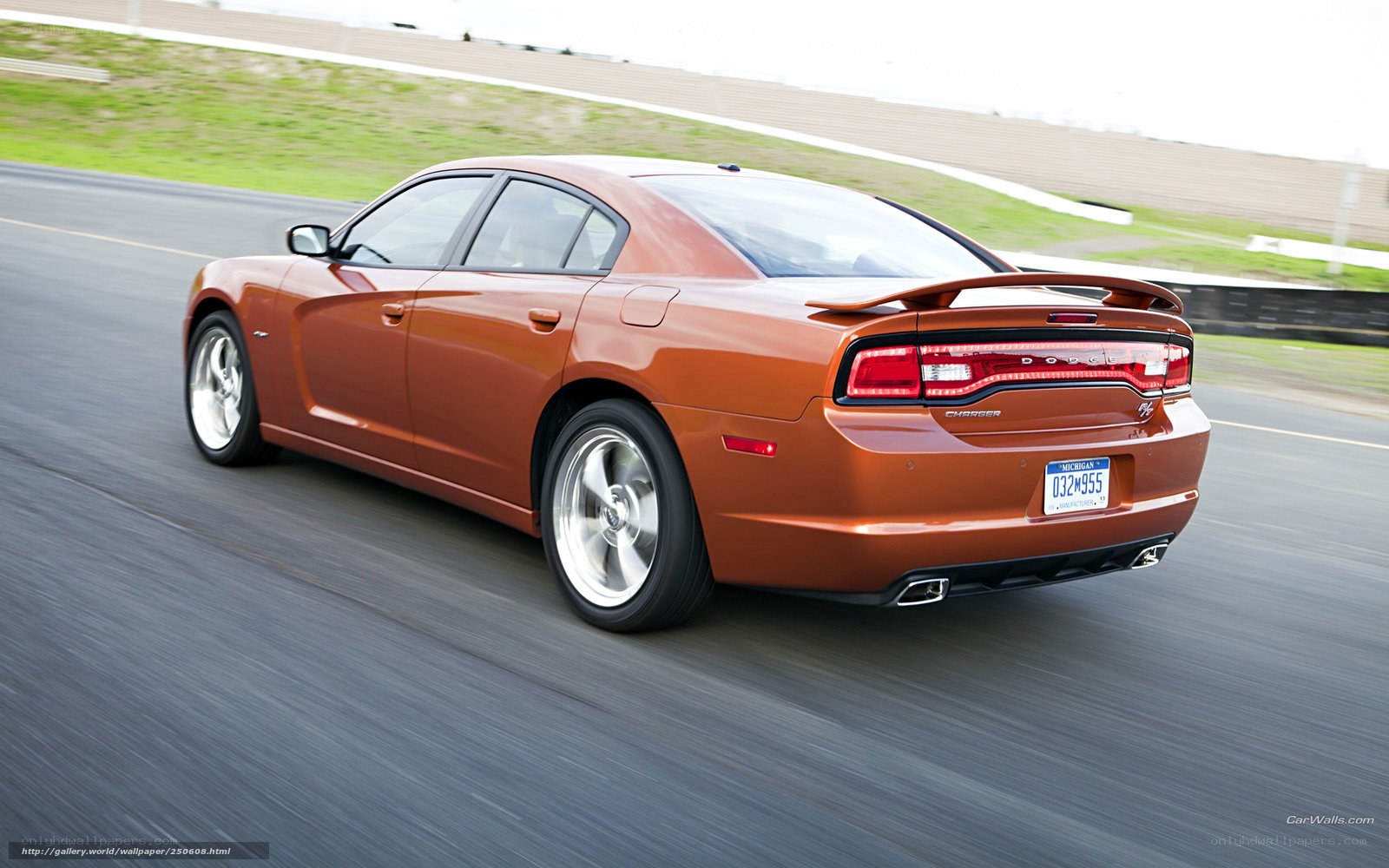 Orange Dodge Charger on track