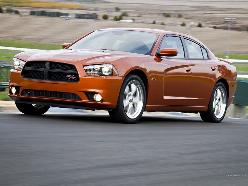 orange dodge charger r/t on track