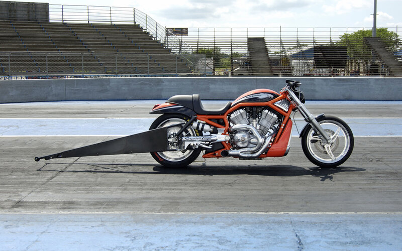 orange drag motorcycle on track