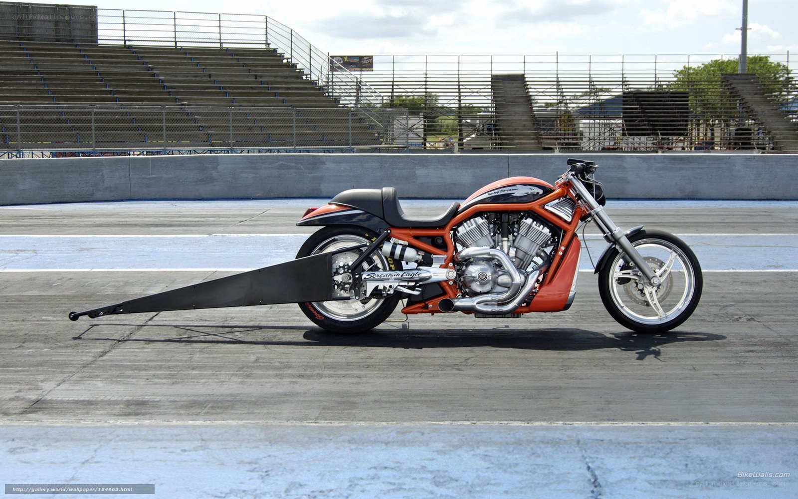 orange drag motorcycle on track