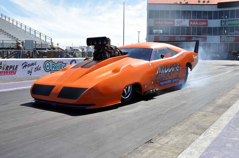 Orange Drag Racing Car — Dynamic, Afternoon, Photograph, Race Track, Bleachers