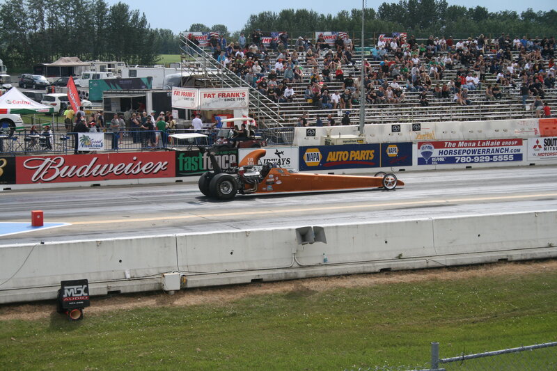 Orange Dragster on Track