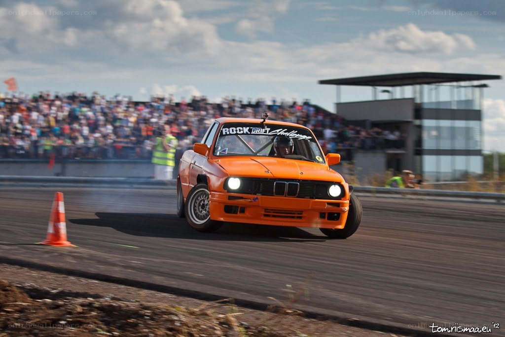 Orange drift car at race