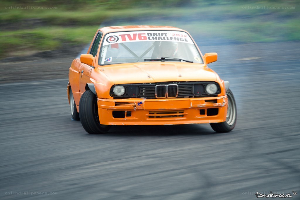 Orange drift car in action