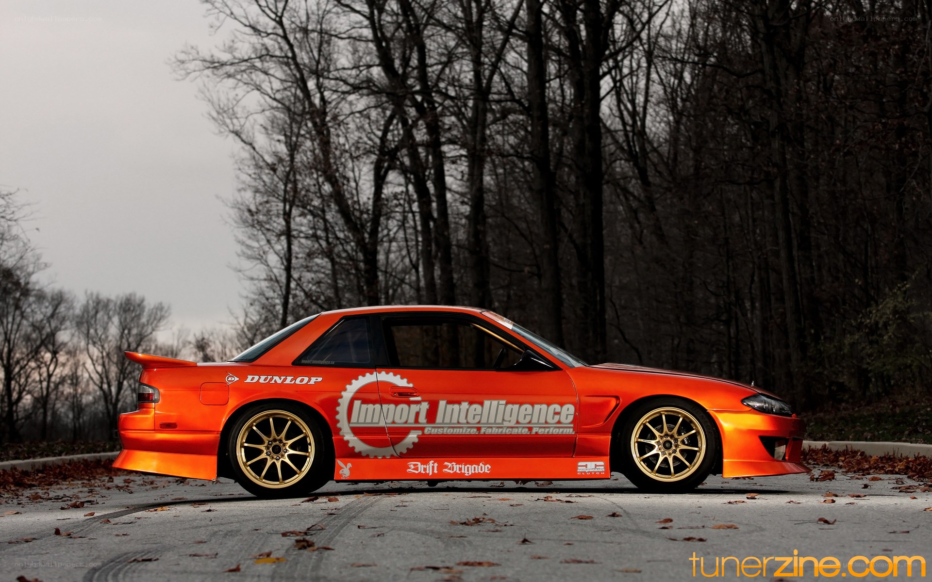orange drift car in forest
