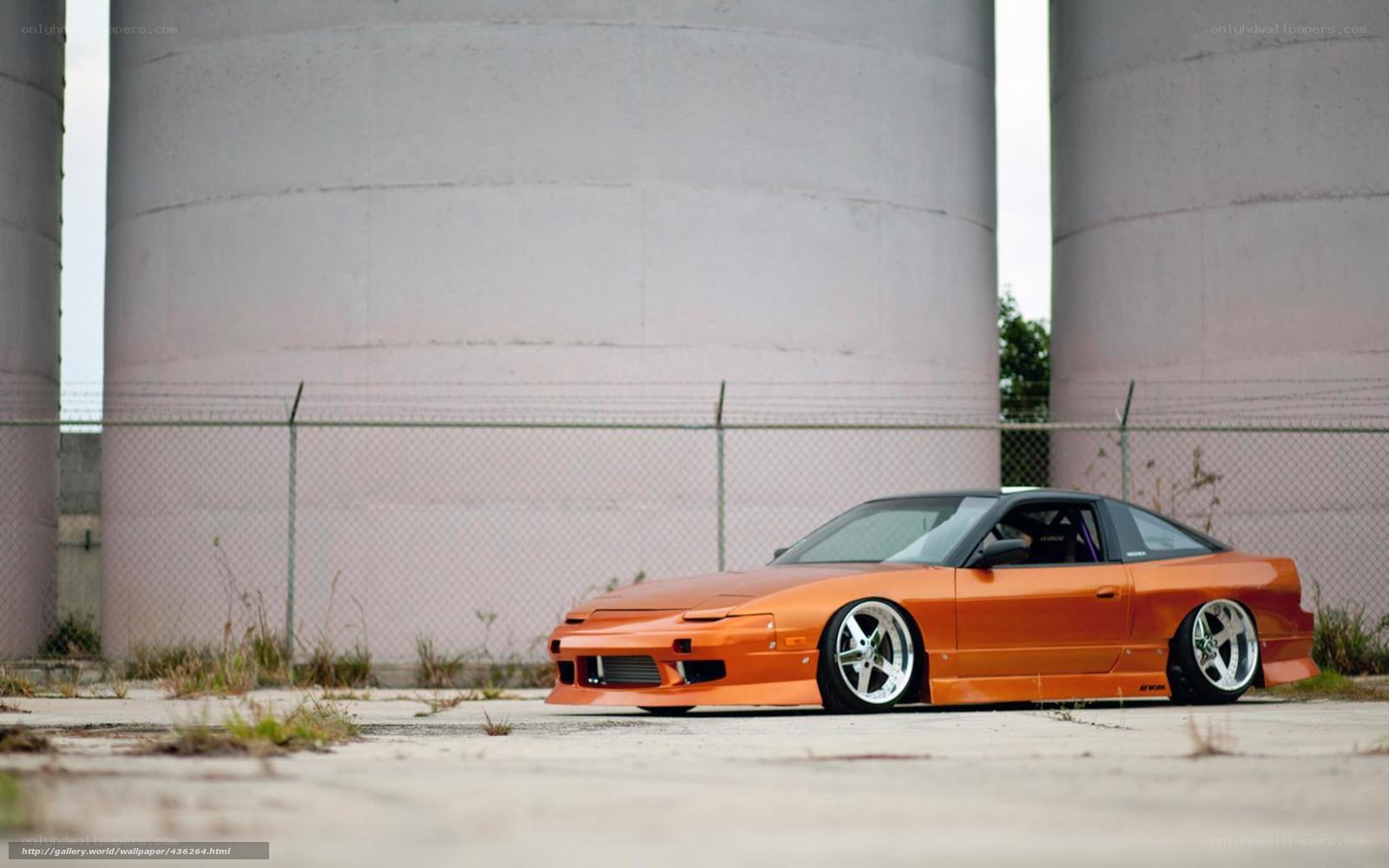Orange drift car in industrial area