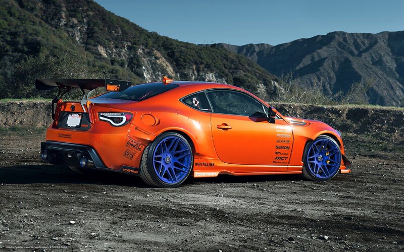 orange drift car on dirt