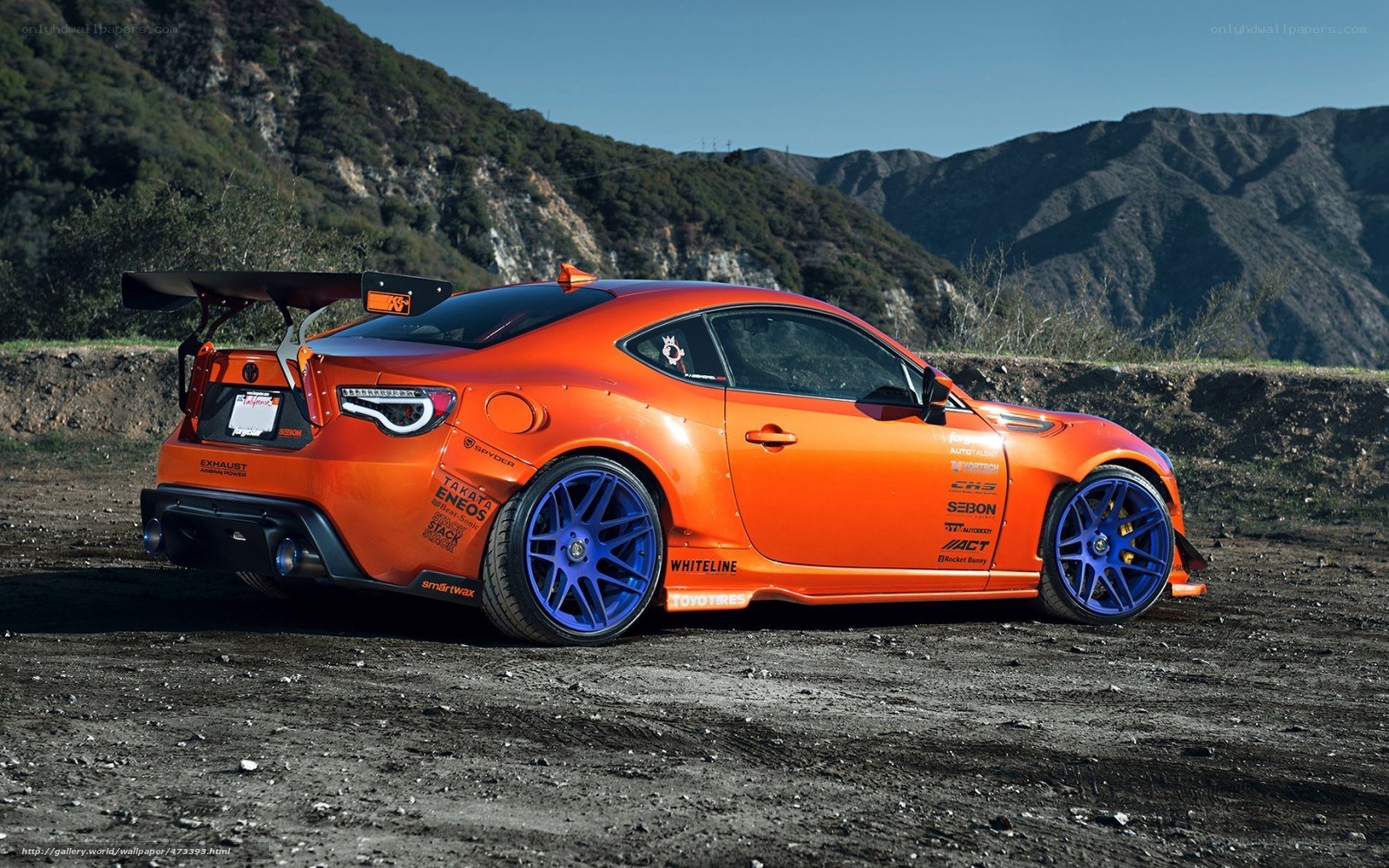 orange drift car on dirt