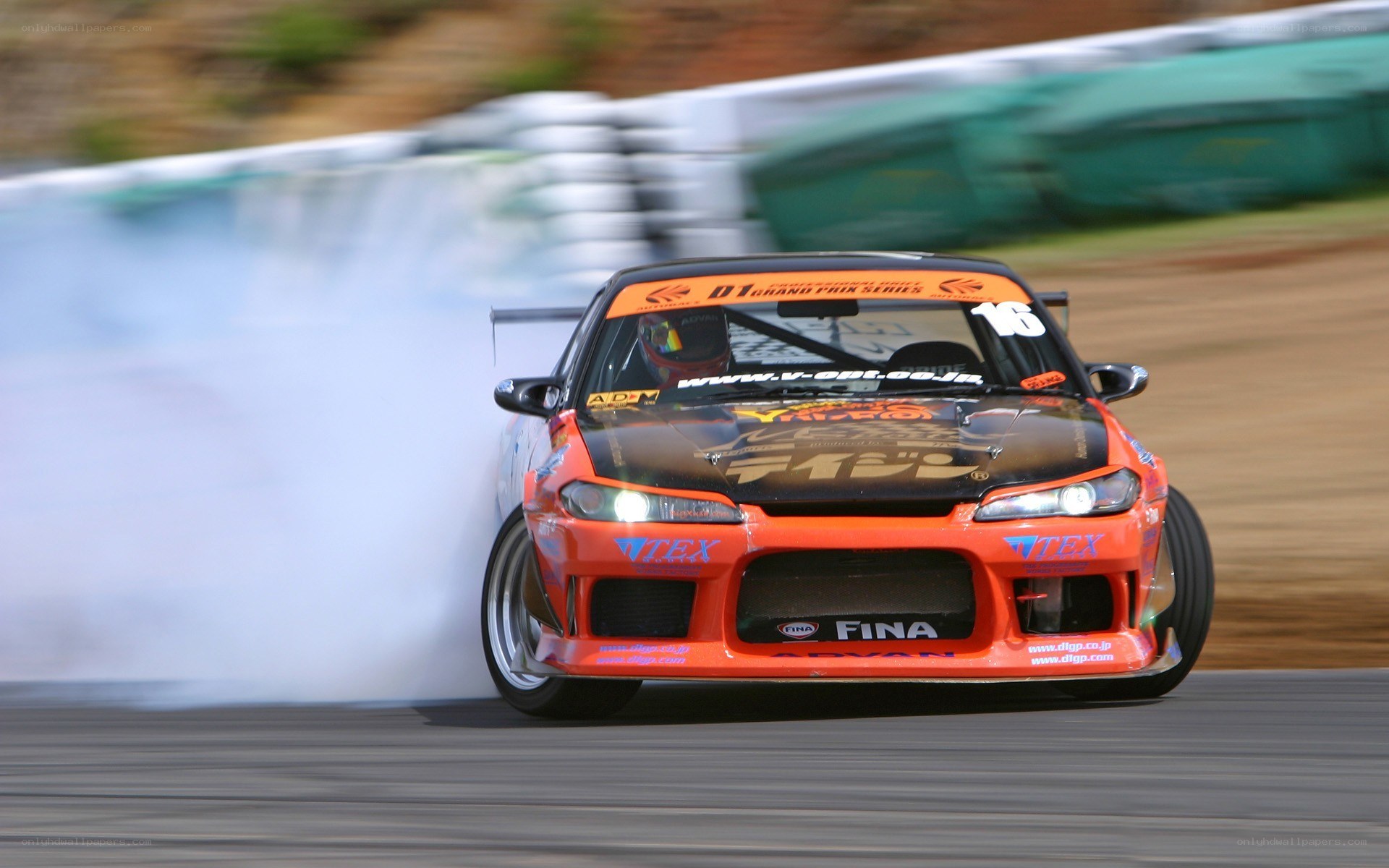 Orange drift car on track