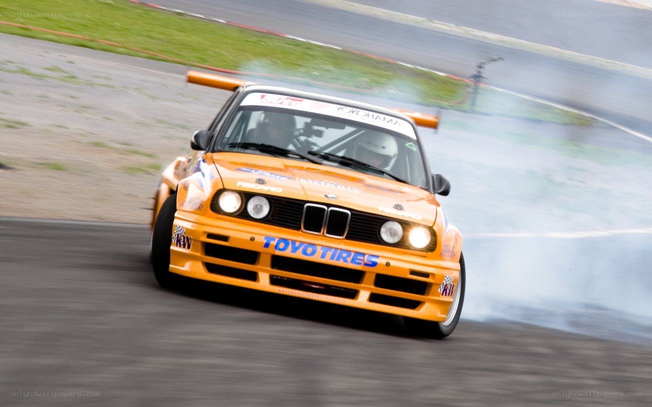 Orange drift car on track