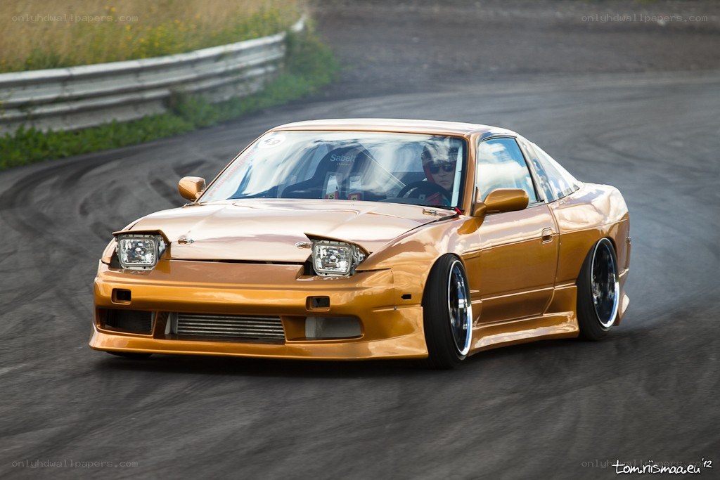 Orange drift car on track