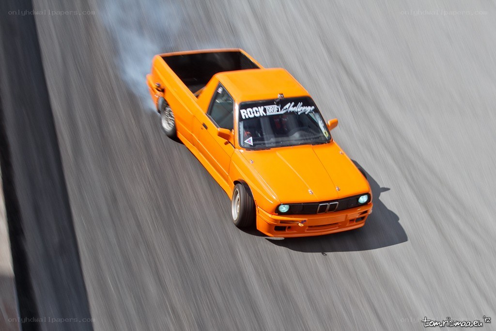 Orange drift truck on track