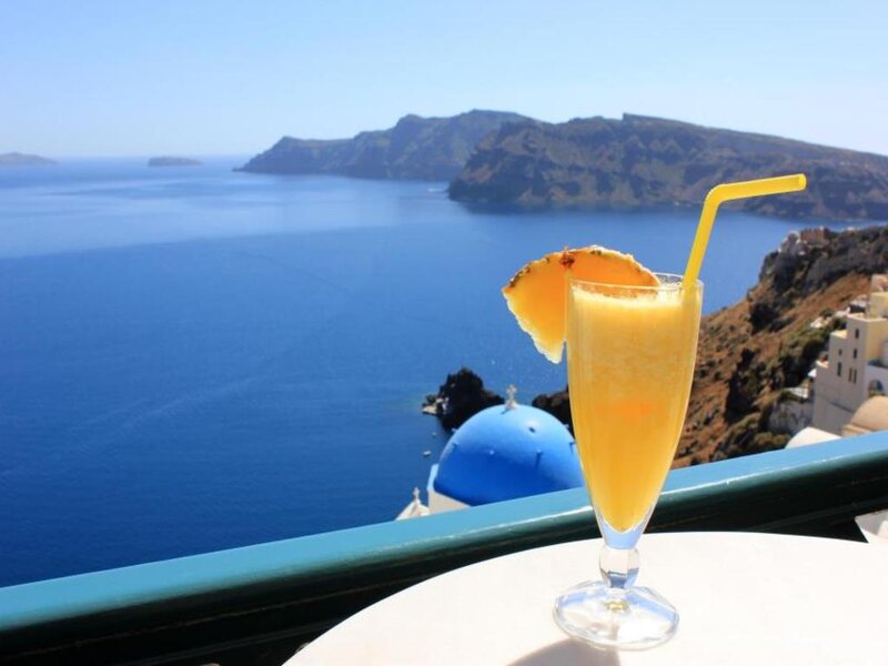 Orange Drink on Balcony