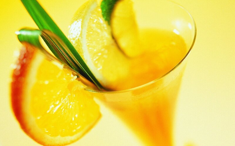 orange drink with garnish