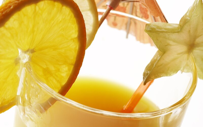 orange drink with garnish