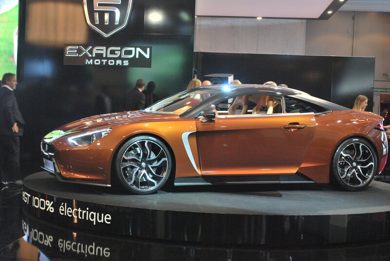 Orange Electric Car — Showroom