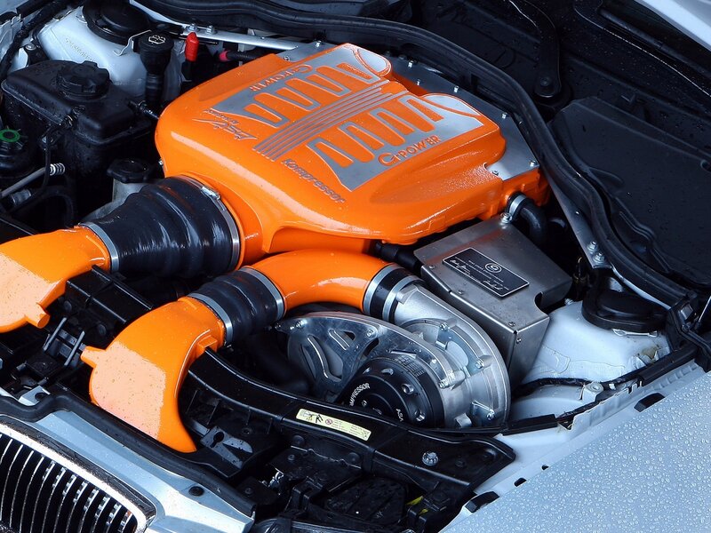 orange engine cover in car