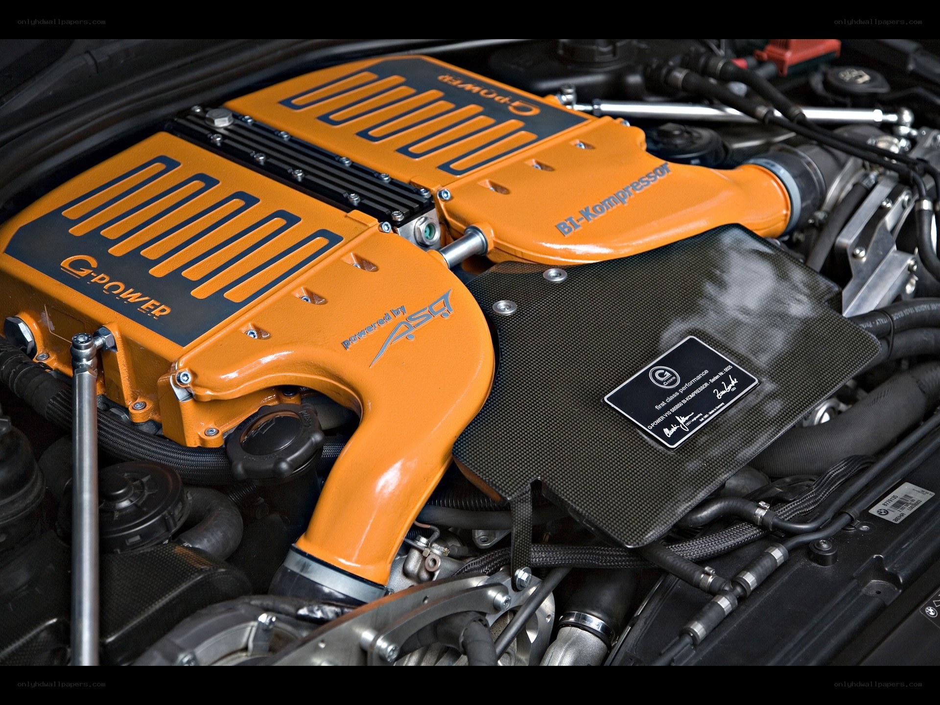 orange engine covers in car