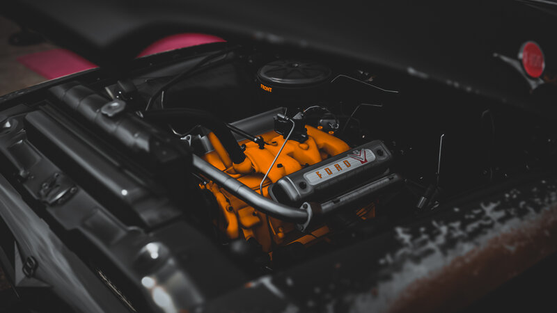 Orange Engine in Car — Black