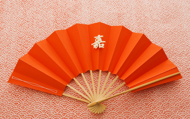Orange fan with Chinese character