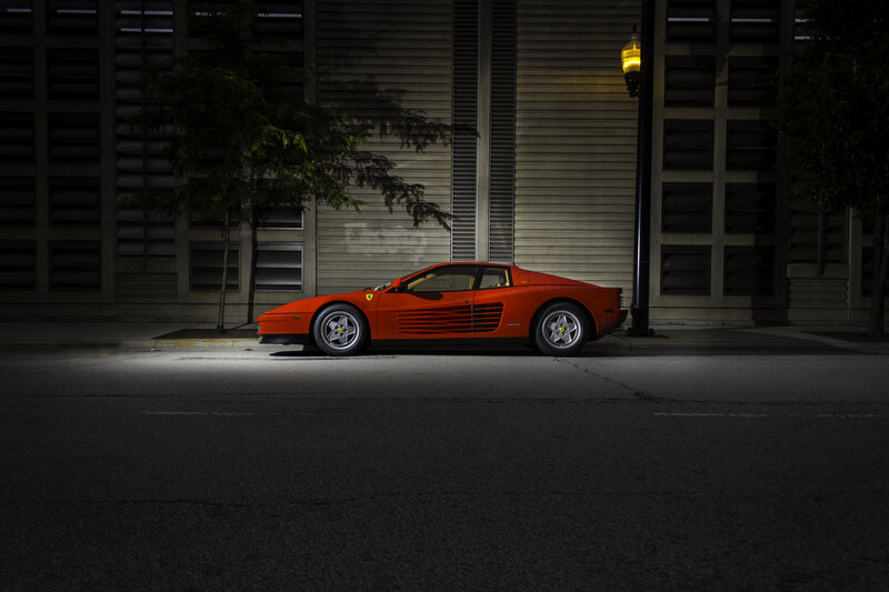 Orange Ferrari at night