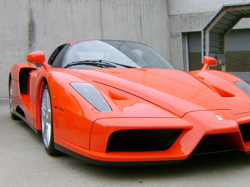 orange Ferrari Enzo sports car