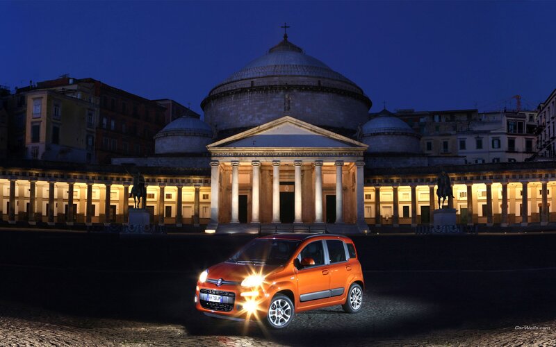 Orange Fiat Panda at night