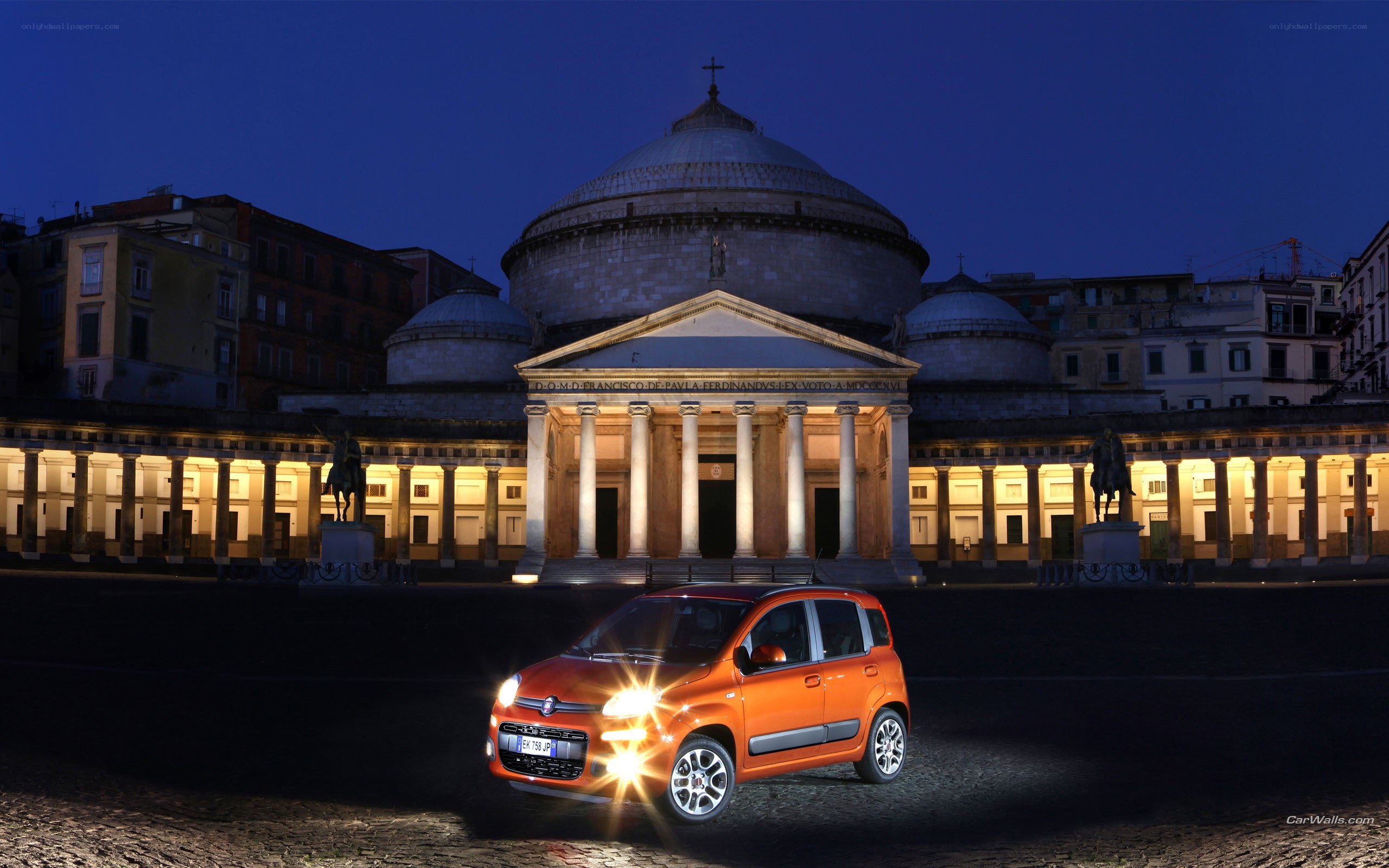 Orange Fiat Panda at night