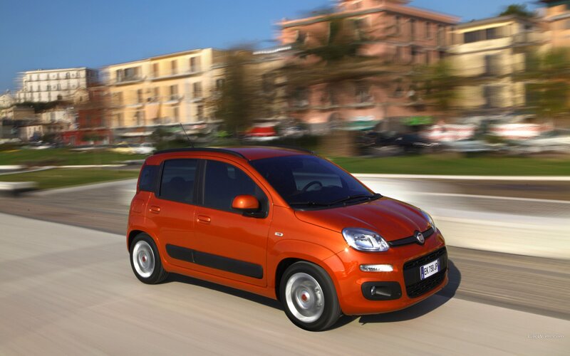 Orange Fiat Panda in motion