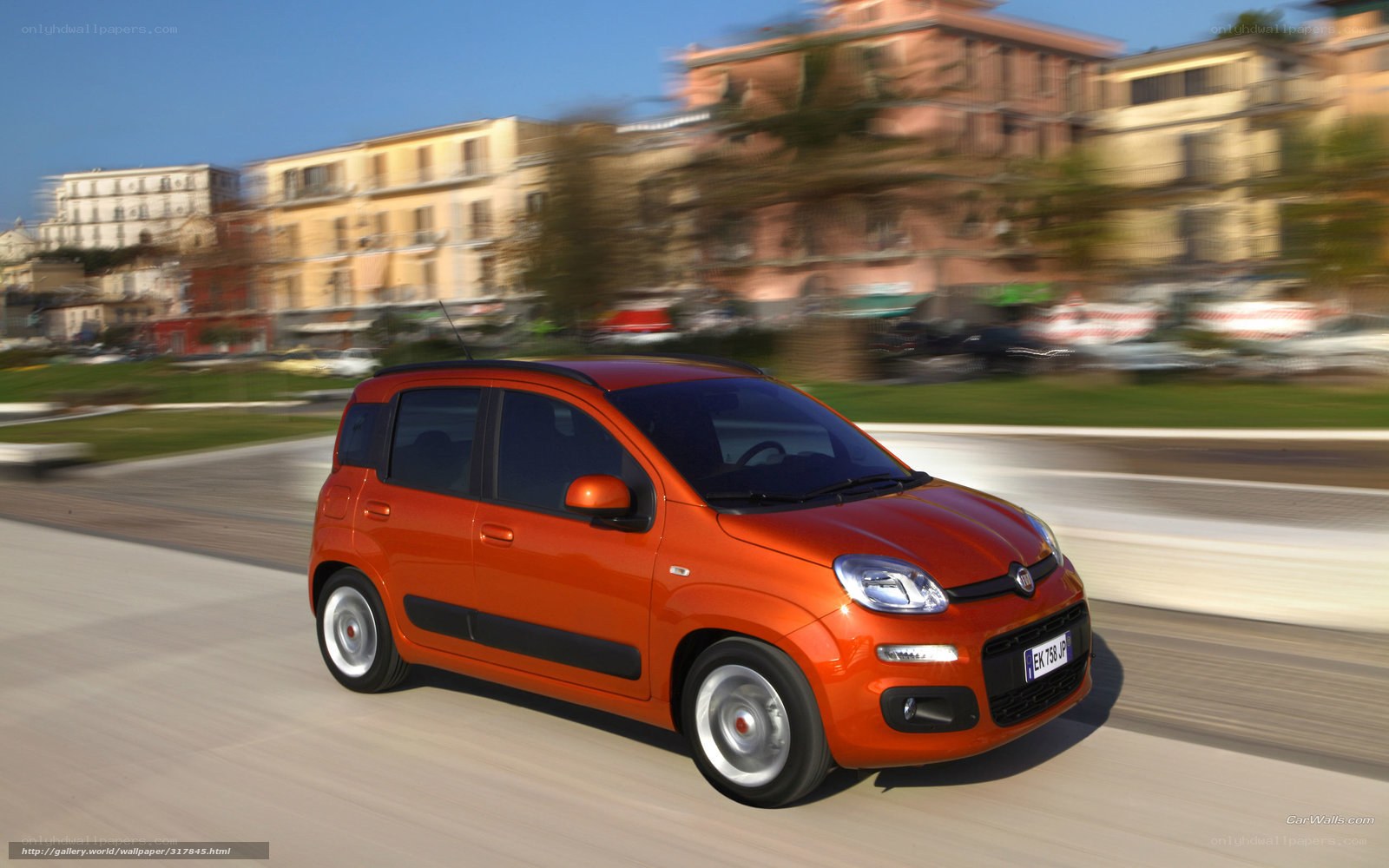 Orange Fiat Panda in motion