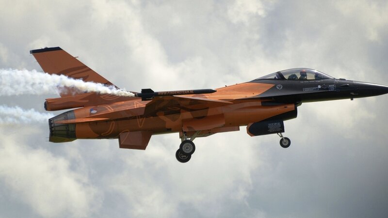 Orange Fighter Jet — Dynamic, Afternoon, Photograph, Smoke